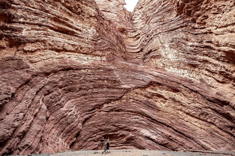 Monumental rock formation with impressive geological structures. Impression of vastness and force