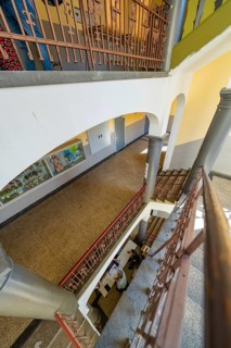A nested staircase with decorative banisters and warm light, Nagold, Black Forest, Germany