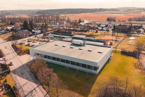 Industrial building surrounded by fields and trees in a rural area, Ötisheim, Enzkreis, Germany