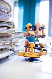 Pile with court files at the local court, stamp carousel with stamp announced on, symbolic image,