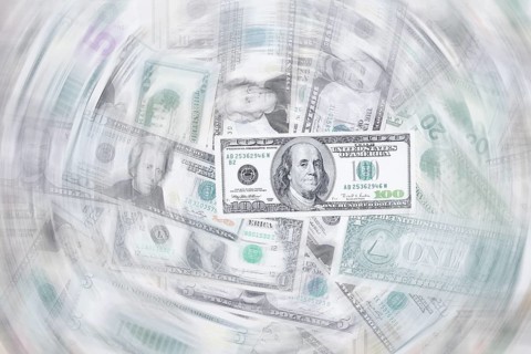 Various US dollar notes in a pile, banknotes