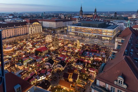 Striezelmarkt Christmas market and the old town from above with castle and cultural palace,