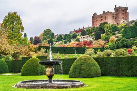 Autumn colors over Powis Castle and Garden, Welshpool, Powys, Wales, UK