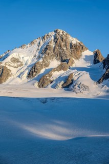 High alpine mountain landscape at sunset, summit of the Aiguille de Chardonnet and Glacier du Tour