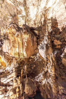 Majestic stalactites and stalagmites create a breathtaking spectacle in postojna cave, slovenia, a