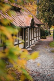 Bird house in the spa gardens during autumn, Bad Wildbad, Black Forest, Germany