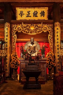 HANOI, VIETNAM, JUNE 11, 2011: Confucius statue at the Temple of Literature. This temple is