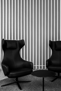 Black leather armchairs in the foyer, Berlin, Germany