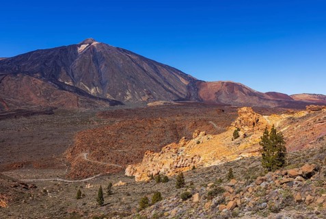 Mountain hiking on Montana Guajara, Canada del Capricho rock formation with view to Mount Teide,