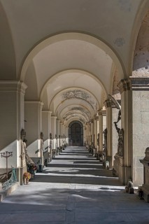 Arcade with tombs at the Monumental Cemetery, Cimitero monumentale di Staglieno), Genoa, Italy