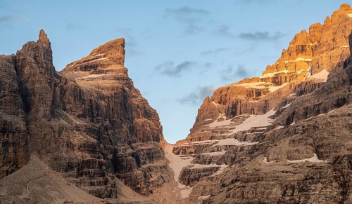 Sunset, mountain valley, Castelletto Superiore and Cima Sella peaks, back Scharte Bocca di Tuckett,