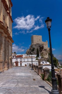 White village with La Encarnacion church on the Moorish hill, Olvera, Andalusia, Spain