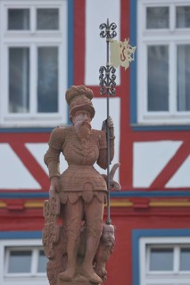 Figure with lance at the market fountain, sculpture, market square, Butzbach, Wetterau, Hesse,