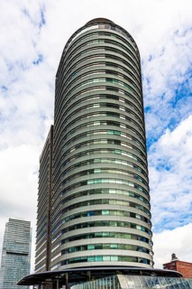 World Port Center, a distinctive skyscraper on Wilhelminapier in the harbor, by British architect