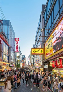 Night-time street with neon lights and illuminated signboards, Dotonbori district, Osaka, Japan