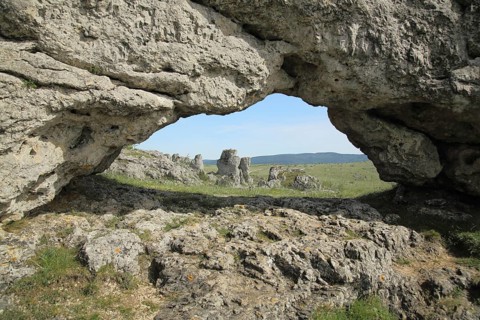 Chaos de Nimes le Vieux, limestone rock formations, hole with a view, rocky landscape, Causse