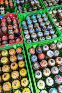 Boxes of paint cans for spraying a graffiti artist in Schwedt an der Oder, Uckermark, Brandenburg,