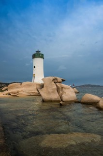 Lighthouse with beach and bizarre granite rocks, Spiaggia Porto Faro, Faro di Punta Palau, Palau,