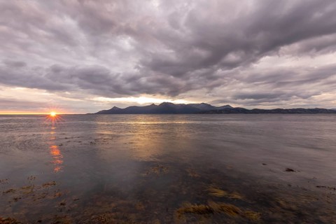 The Vestfjord in Nordland, Norway, offers a dramatic atmosphere near Bodø. Dark clouds are