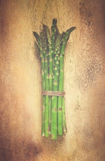 Fresh asparagus, bunch, on the table, top view, no people