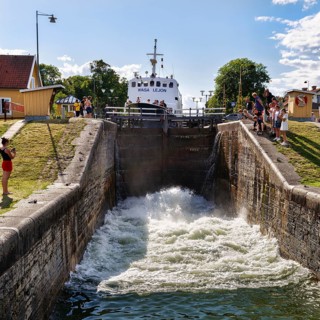 Passenger ship Wasa Lejon with tourists on Göta Canal, lock steps near Berg, Linköping,