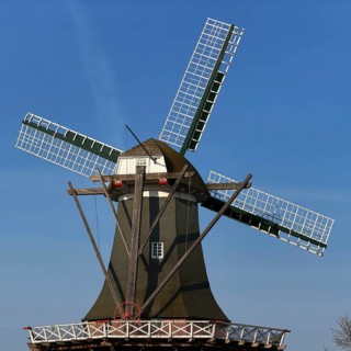 Meyer Mühle or Meyers Mühle with millstone fountain on the main canal, Papenburg, Emsland, Lower
