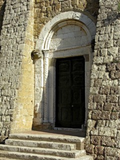 Historic stone carving, portal at the Romanesque Cathedral of St Peter and Paul, Romanesque and