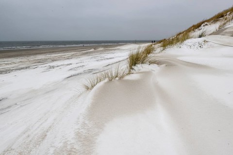 Snow-covered dunes on the North Sea beach, Langeoog, Lower Saxony, Germany