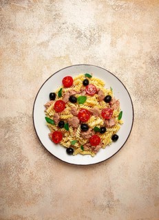Tuna salad, fusilli pasta, olives and cherry, olive oil, homemade