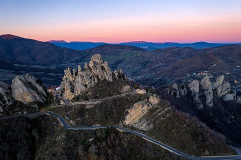 A breathtaking aerial view of Pietrapertosa, perched in the Lucanian Dolomites at sunrise. The