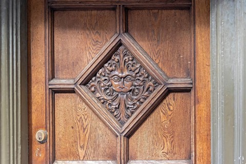 Door decorated with carvings, Brasenose College, Oxford, England, Great Britain