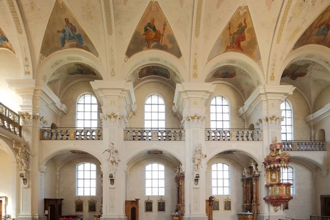 Pulpit, gallery and frescoes of the Baroque monastery church, columns, interior view, ceiling
