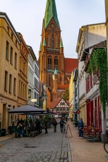 The historic old town of Schwerin, Buschstraße, alley with many restaurants, St.-Marien-Dom zu