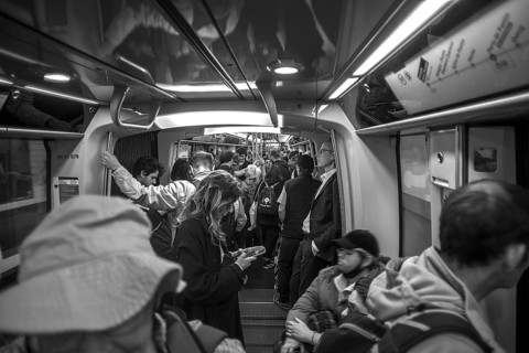 Metro fully staffed at rush hour, black and white, Paris France