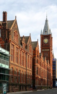 Red brick Victoria building clocktower, Central Campus, University of Liverpool, England, UK