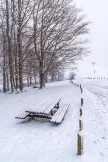 Lots of snow at the picnic area next to the refuge of Mount Aizkorri in Gipuzkoa. Snowy landscape