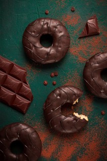 Donuts with cocoa, in chocolate glaze, top view, no people