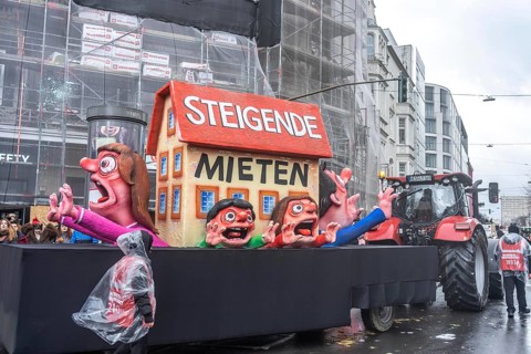 Rose Monday procession in Düsseldorf, theme car by wagon manufacturer Jacques Tilly, topic of