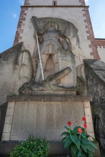 Sculpture of St George with the dragon on a war memorial from both world wars, 1914 to 1918 and