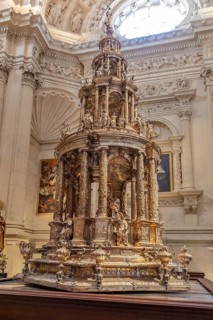 Detailed baroque altar with golden decoration in a church, Seville
