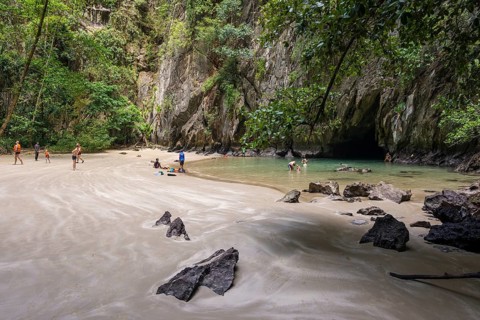 Sandy beach beach with cave in the rainforest, Emerald Cave, Koh Mook, Trang Province, Southern