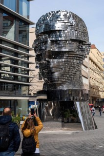 PRAGUE, CZECHIA - MARCH 25, 2023: Statue of Kafka, outdoor sculpture, author David Cerny