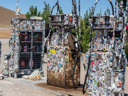 Fuel pump covered with stickers, gas station Baja Caracoles, at ruta nacional 40, Argentina
