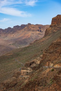 Mountain road at the Degollade de las Yeguas viewpoint with a view of the Barranco de Fataga, Gran