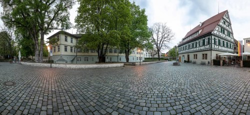 April 19, 2026: Panoramic view of Schlossplatz with Kirchheim Castle and Old Forestry House at