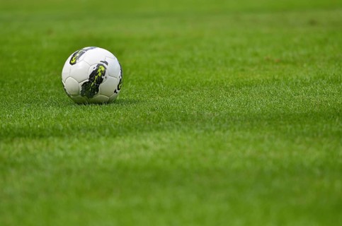 Football ball on the grass in Lubin, Poland