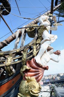 Sailing ship Neptune in the old harbour, Genoa with galleon, Italy