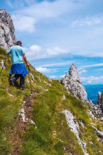 Mount Aizkorri 1523 meters, the highest in Guipuzcoa. Basque Country. A young man climbing with