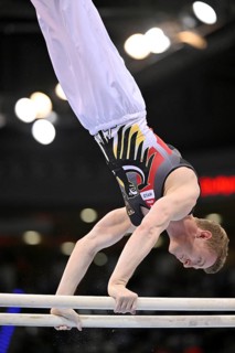 Nils Dunkel GER parallel bars action gymnastics, EnBW DTB-Pokal, Porsche-Arena, Stuttgart,