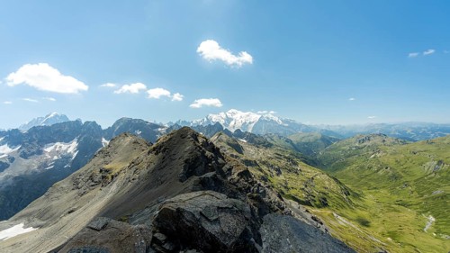 Capture the breathtaking summer landscape of the French Alps near Chamonix and Mont Blanc.